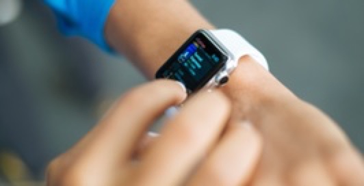 person using their smartwatch